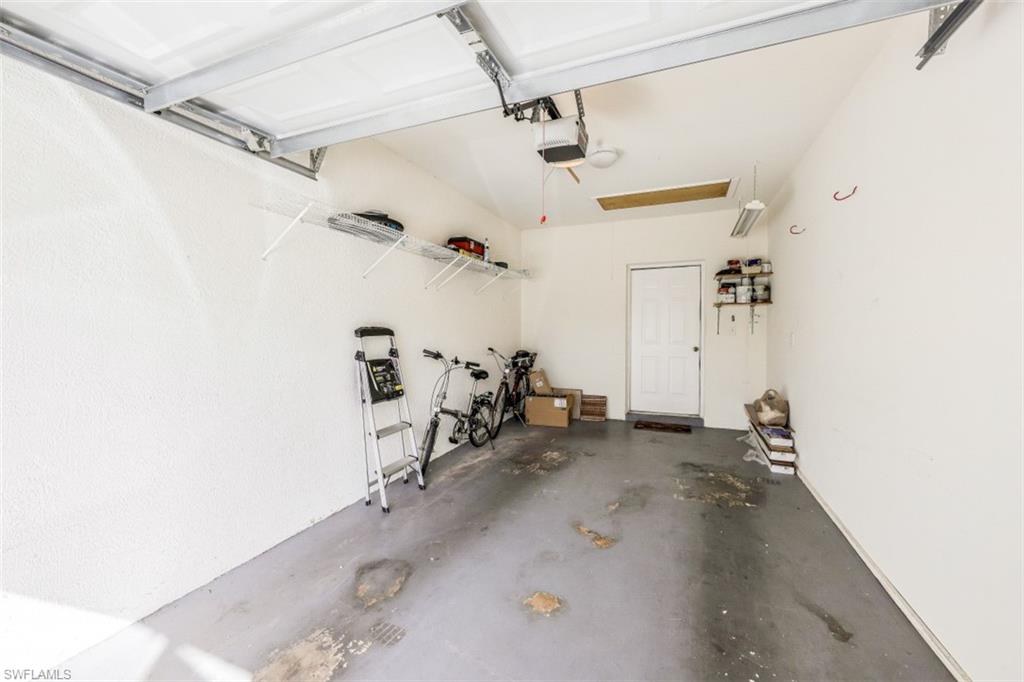 78 Bennington Drive, Unit 58 Naples, FL 34104 - Photo 24 of 24 a view of a room with gym equipment