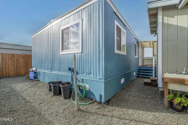 a view of a balcony with chairs