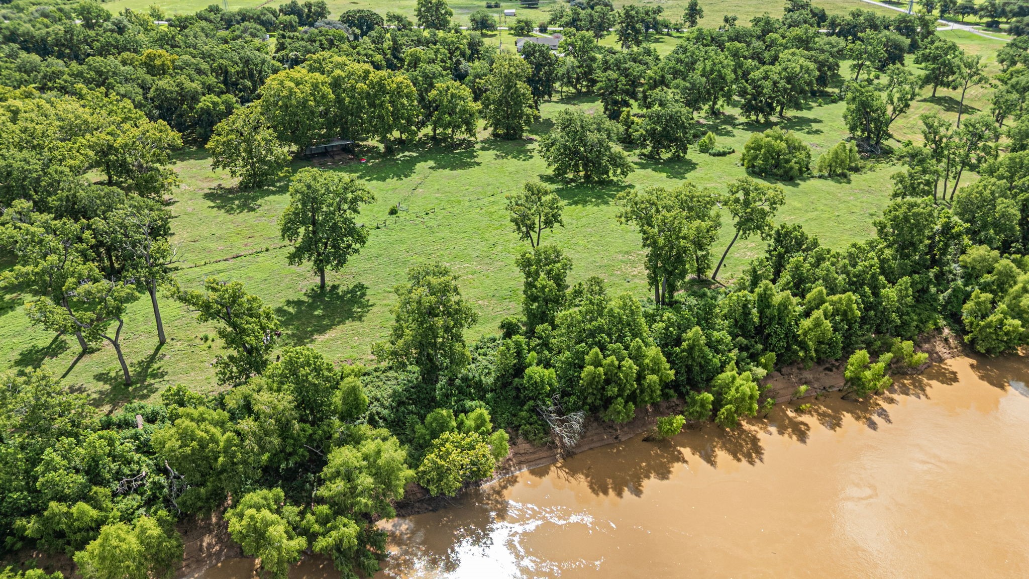 0 Baker Road Rosenberg, TX 77471 - Photo 7 of 9 a view of a lake with a yard