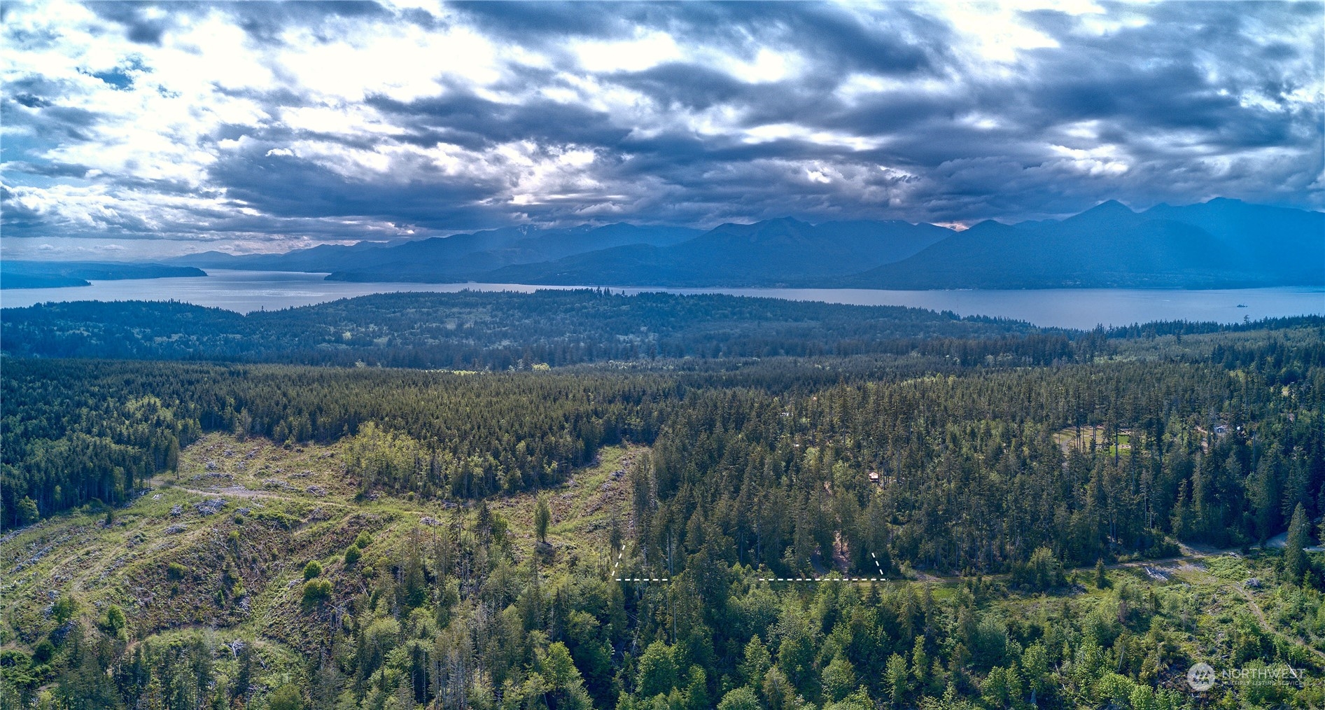 376 Whitney Road Quilcene, WA 98376 - Photo 25 of 31 a view of a lake from a yard
