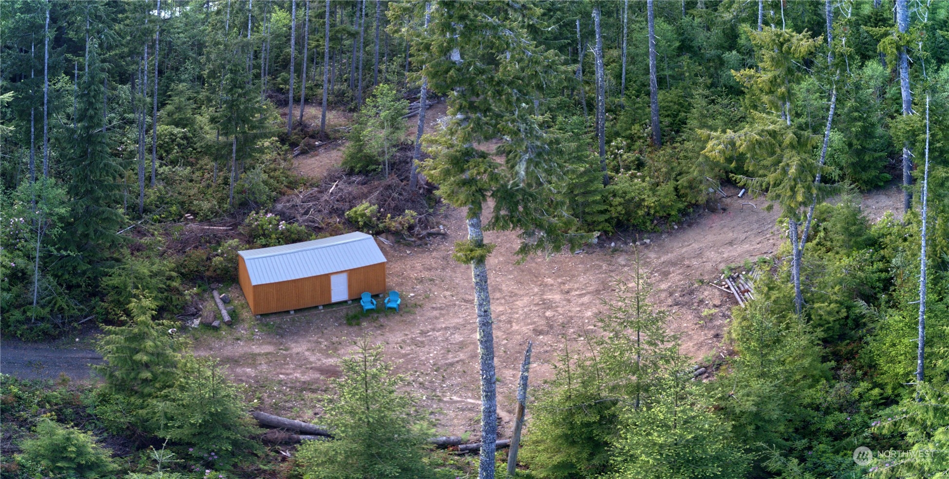 376 Whitney Road Quilcene, WA 98376 - Photo 9 of 31 a view of a bench in a garden