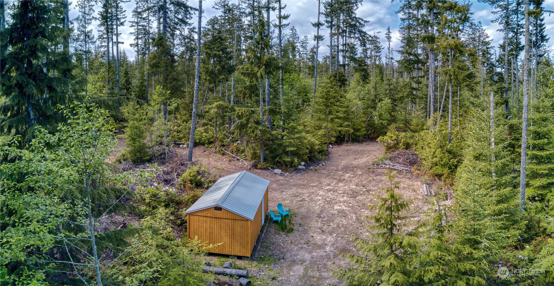 376 Whitney Road Quilcene, WA 98376 - Photo 10 of 31 an aerial view of a house with a yard