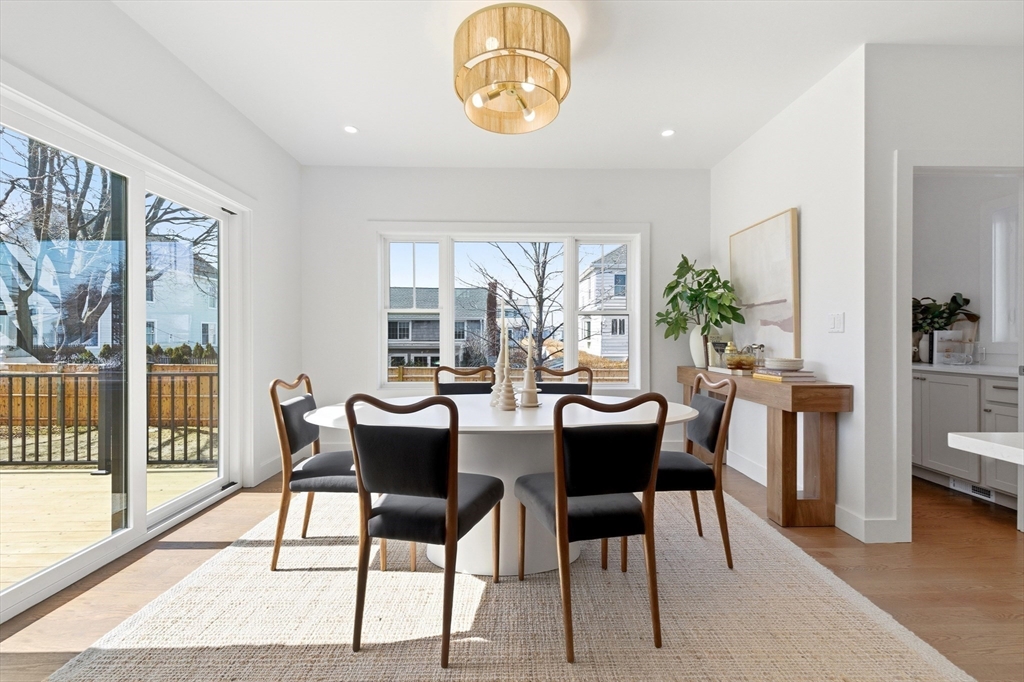 51 Fox Hill Road Nahant, MA 01908 - Photo 14 of 36 a dining room with furniture window and wooden floor