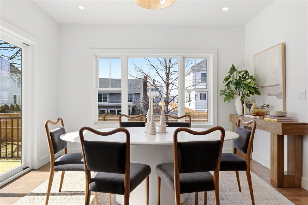 51 Fox Hill Road Nahant, MA 01908 - Photo 15 of 36 a view of a dining room with furniture and wooden floor