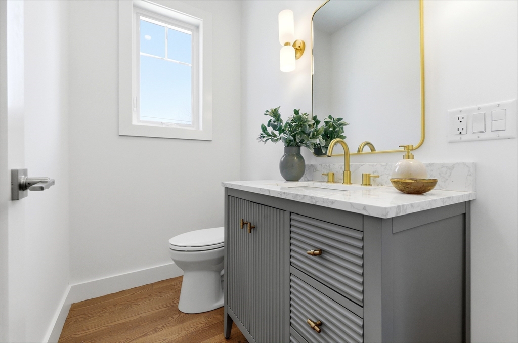 51 Fox Hill Road Nahant, MA 01908 - Photo 22 of 36 a bathroom with a sink toilet and a mirror