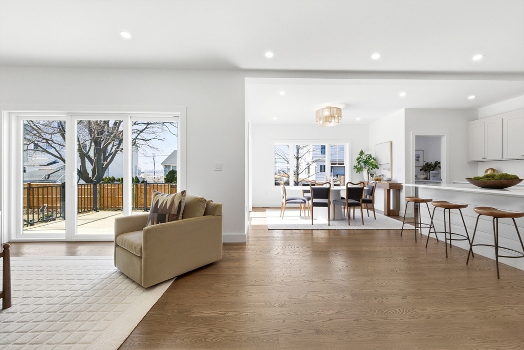 51 Fox Hill Road Nahant, MA 01908 - Photo 7 of 36 a living room with furniture and a table