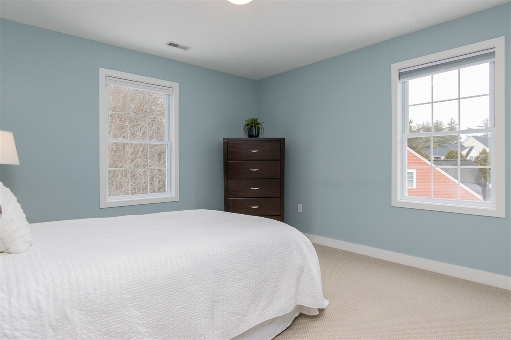 1 Integrity Way Groton, MA 01450 - Photo 25 of 36 a bedroom with a bed and a window