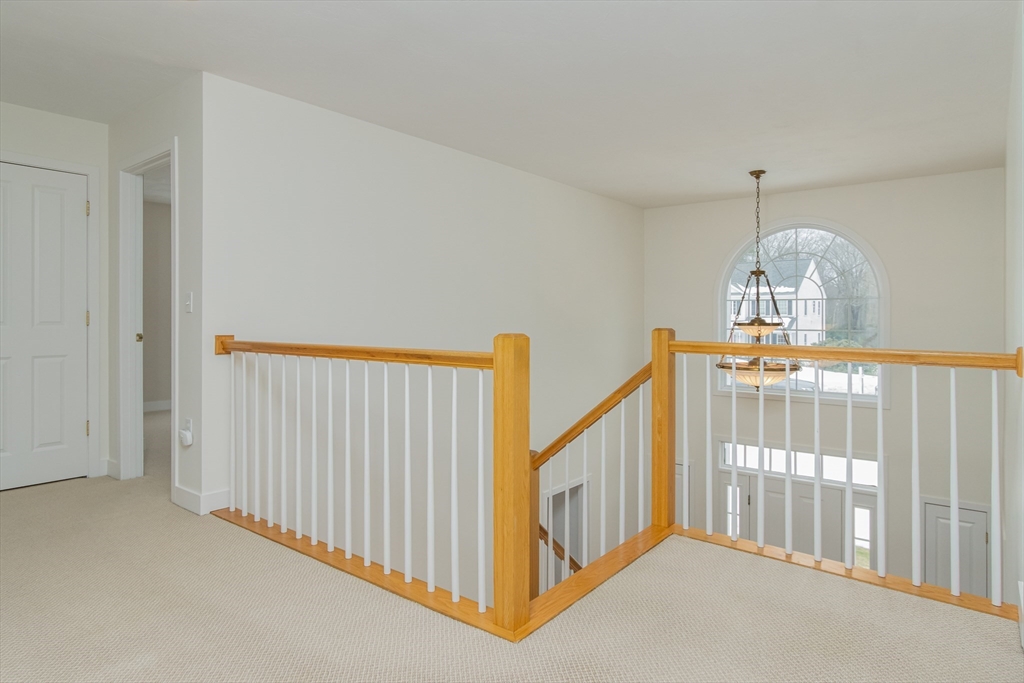 1 Integrity Way Groton, MA 01450 - Photo 29 of 36 a view of a hallway with windows