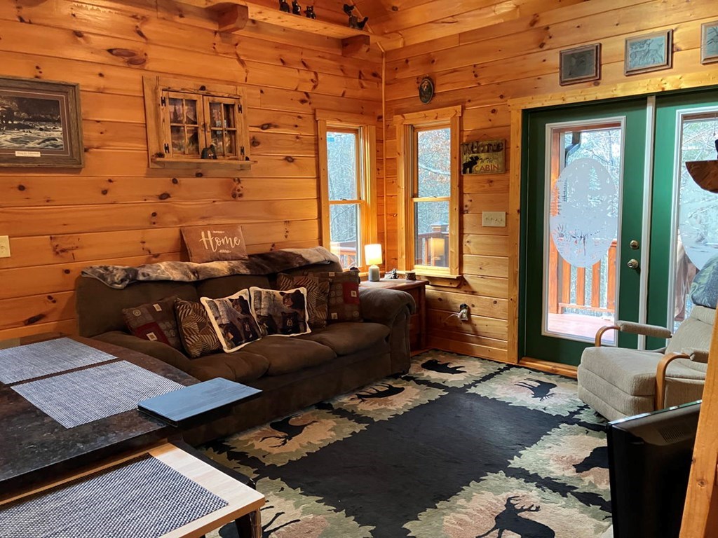 167 Lemon Drop Lane Murphy, NC 28906 - Photo 4 of 23 a couple of chairs sitting in front of a building