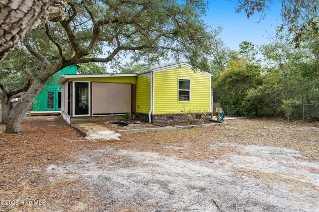 $325,000 | 118 Northeast 67th Street, Oak Island, NC 28465