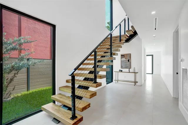a bathroom with a sink and mirror