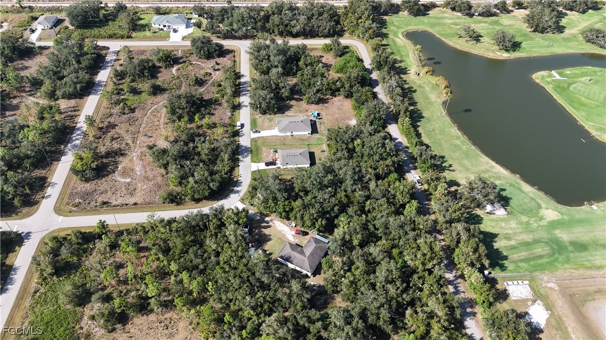 29359 Nottingham Road Punta Gorda, FL 33982 - Photo 11 of 20 an aerial view of a house with a yard and lake view