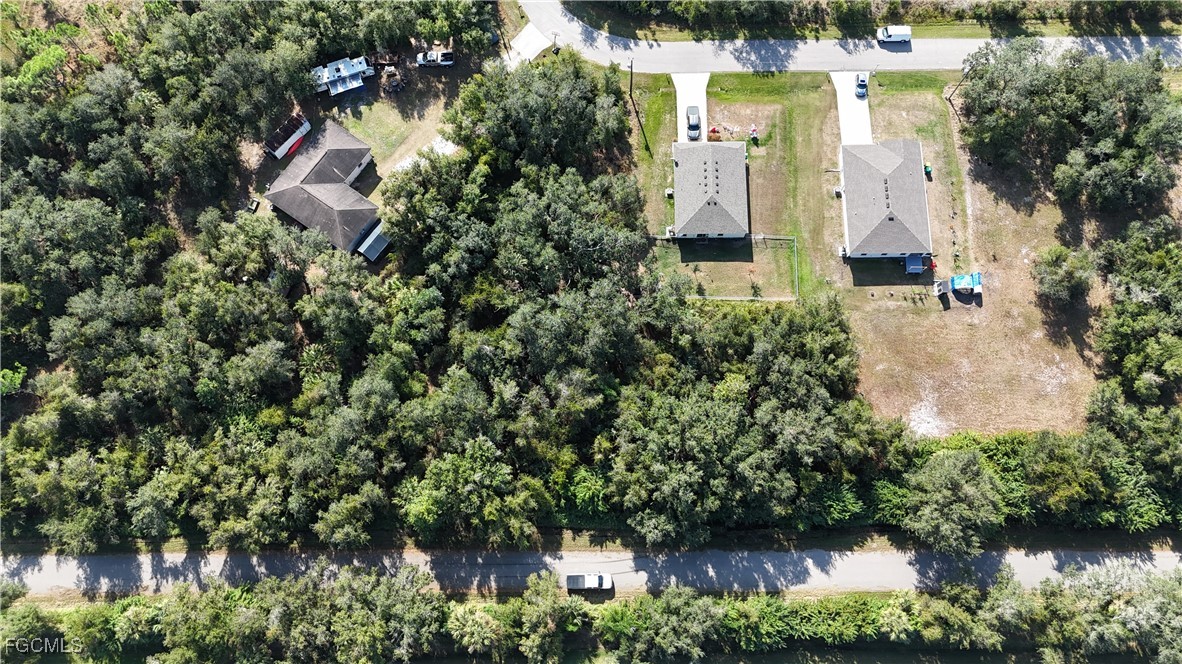 29359 Nottingham Road Punta Gorda, FL 33982 - Photo 16 of 20 a aerial view of a house with a yard and garden