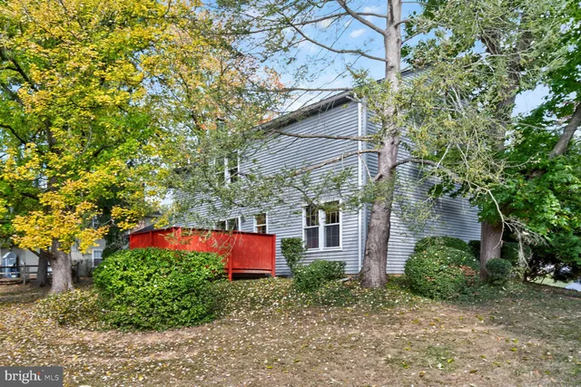 a house view with a backyard space