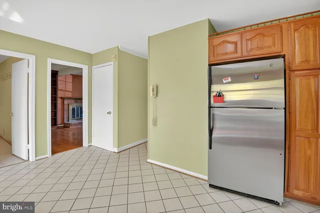 a room with a bed and cabinets