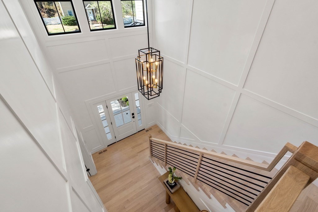 258 Greendale Avenue Needham, MA 02494 - Photo 12 of 23 a view of staircase with wooden floor