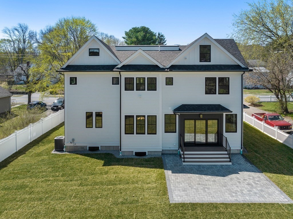 258 Greendale Avenue Needham, MA 02494 - Photo 22 of 23 a front view of a house with a yard