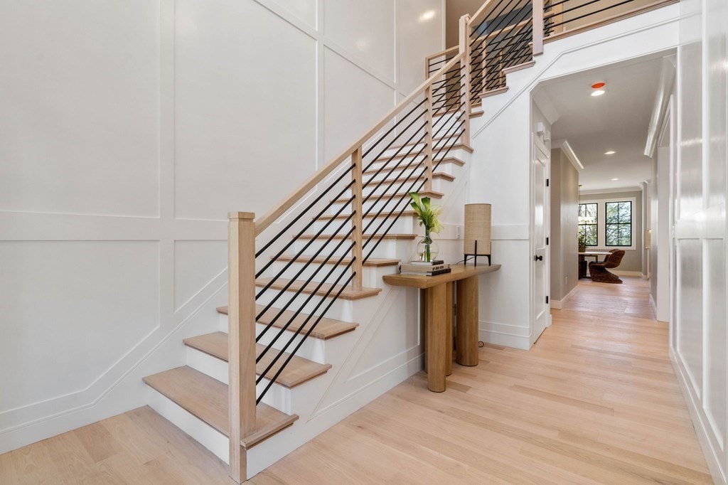 258 Greendale Avenue Needham, MA 02494 - Photo 3 of 23 a view of entryway and hall with wooden floor