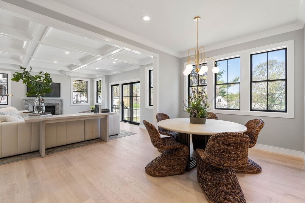258 Greendale Avenue Needham, MA 02494 - Photo 9 of 23 a large white kitchen with a large window