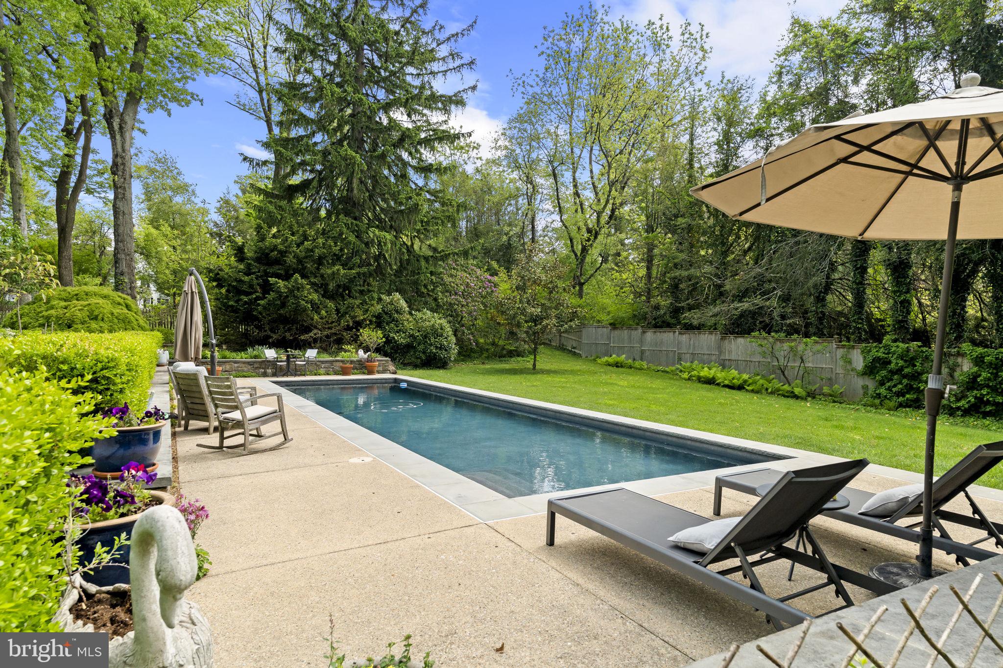 437 Church Road Devon, PA 19333 - Photo 51 of 65 Salt water heated pool.