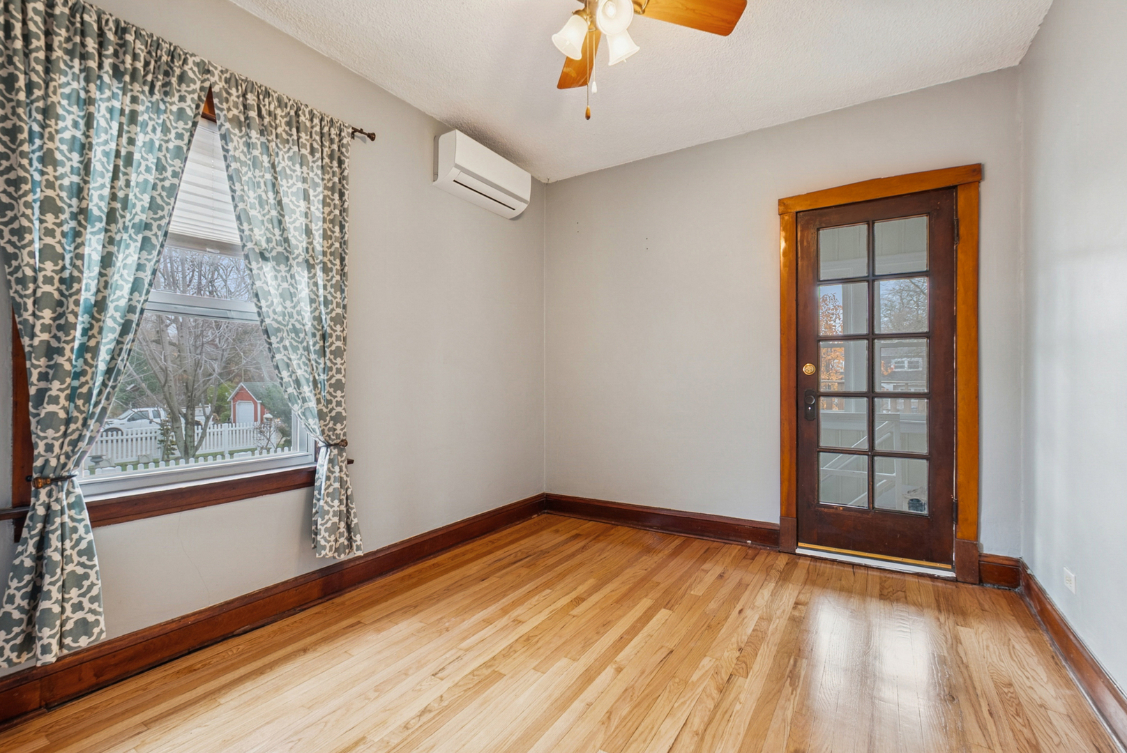 1321 Ridge Road Homewood, IL 60430 - Photo 9 of 25 a view of empty room with wooden floor and fan