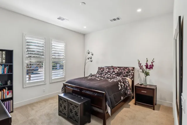 a bathroom with a sink toilet and vanity