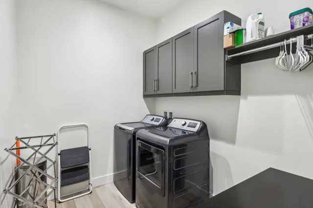 a bed room with a bed and a television