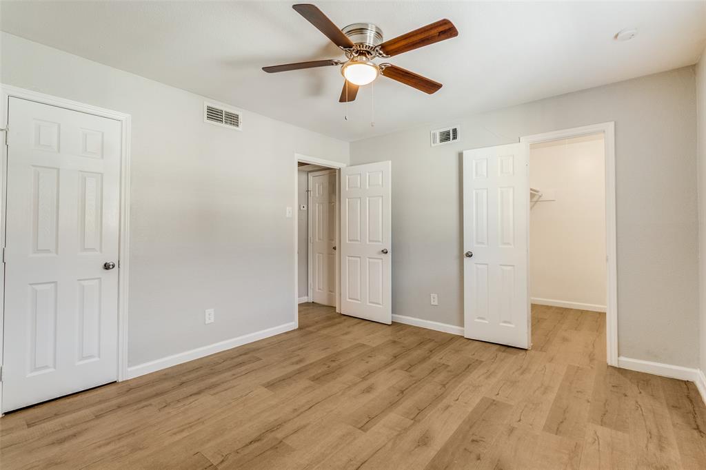 4618 Reiger Avenue, Unit 211 Dallas, TX 75246 - Photo 17 of 19 wooden floor in an empty room