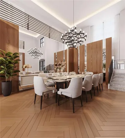 a view of a a dining room with furniture window and wooden floor