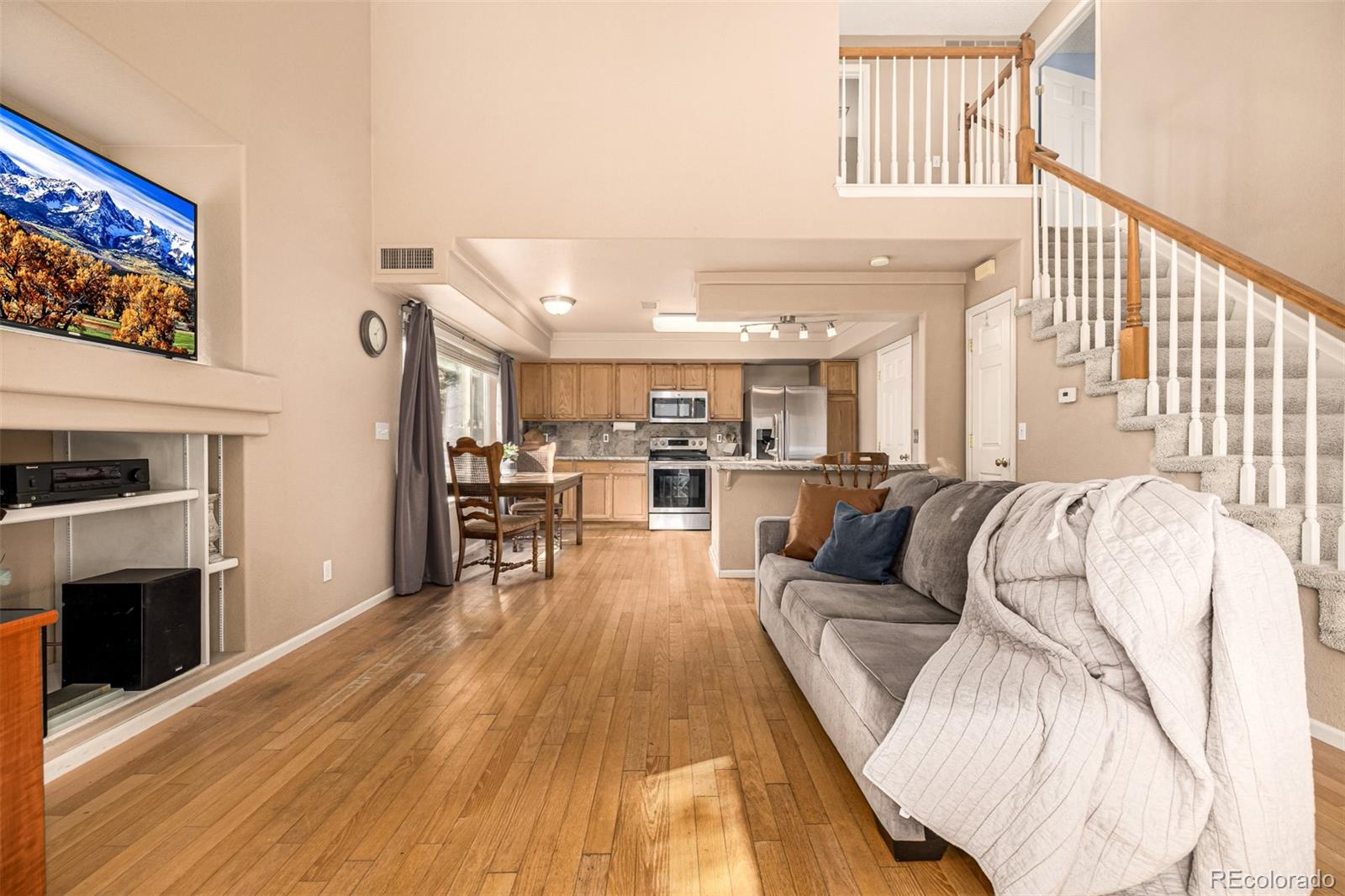 21300 East 42nd Avenue Denver, CO 80249 - Photo 14 of 48 a living room with furniture and a fireplace