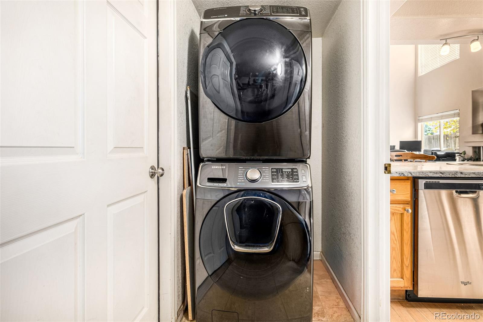21300 East 42nd Avenue Denver, CO 80249 - Photo 20 of 48 a view of a bedroom with washer and dryer