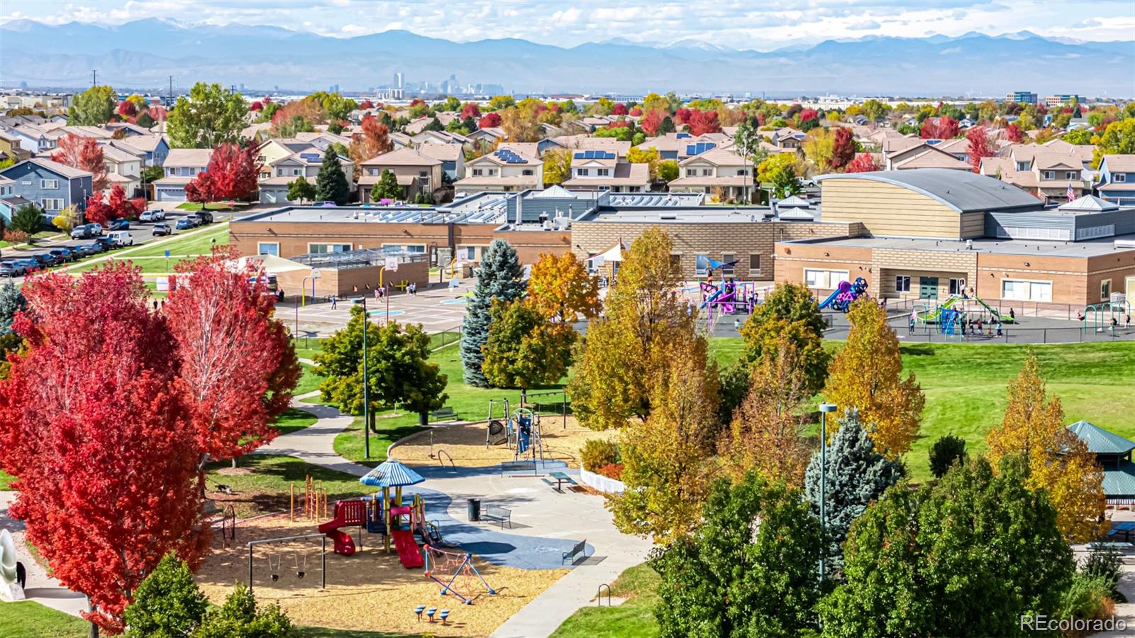 21300 East 42nd Avenue Denver, CO 80249 - Photo 43 of 48 a view of swimming pool with outdoor seating