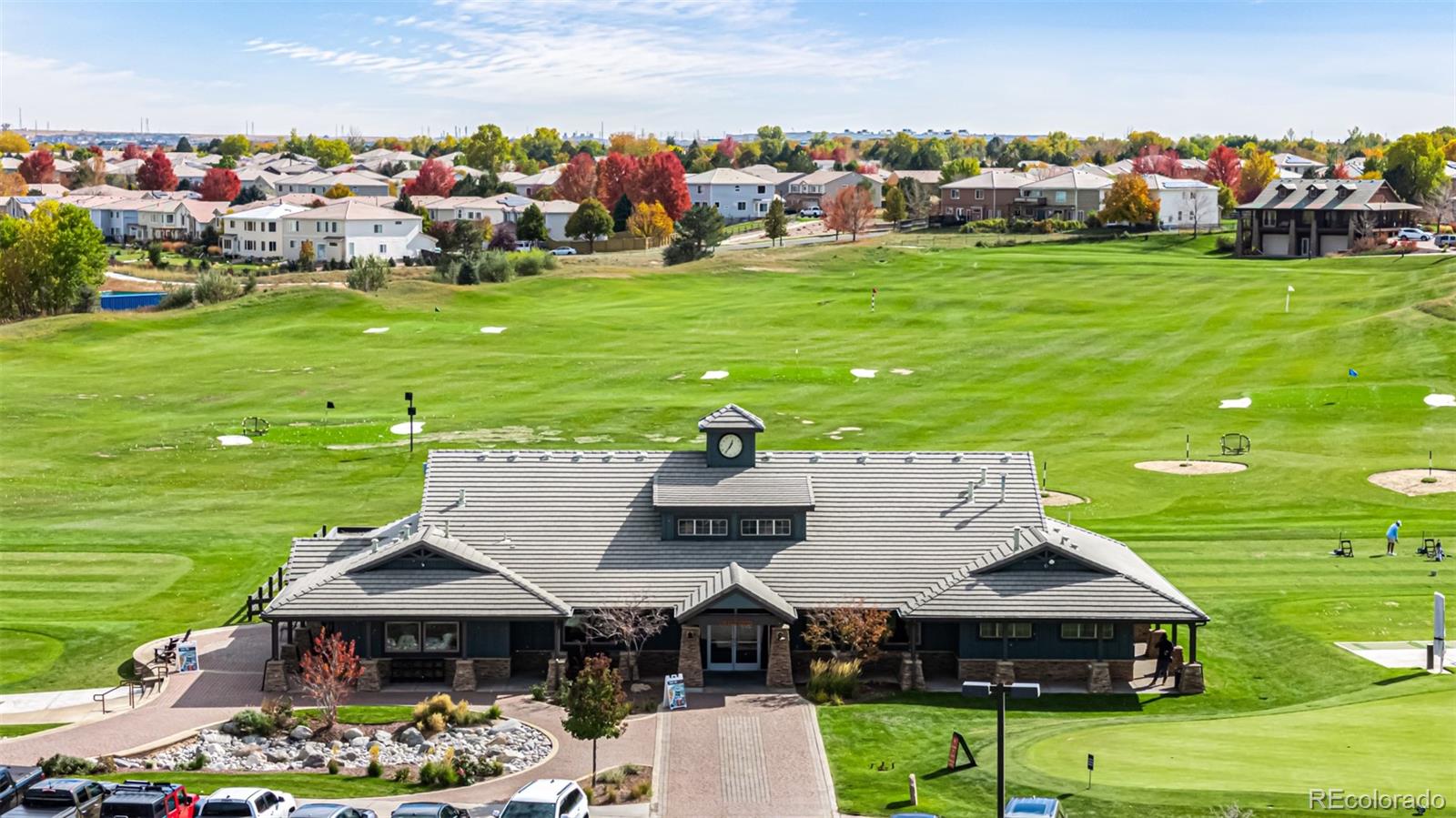 21300 East 42nd Avenue Denver, CO 80249 - Photo 48 of 48 a view of a table and chairs in the garden
