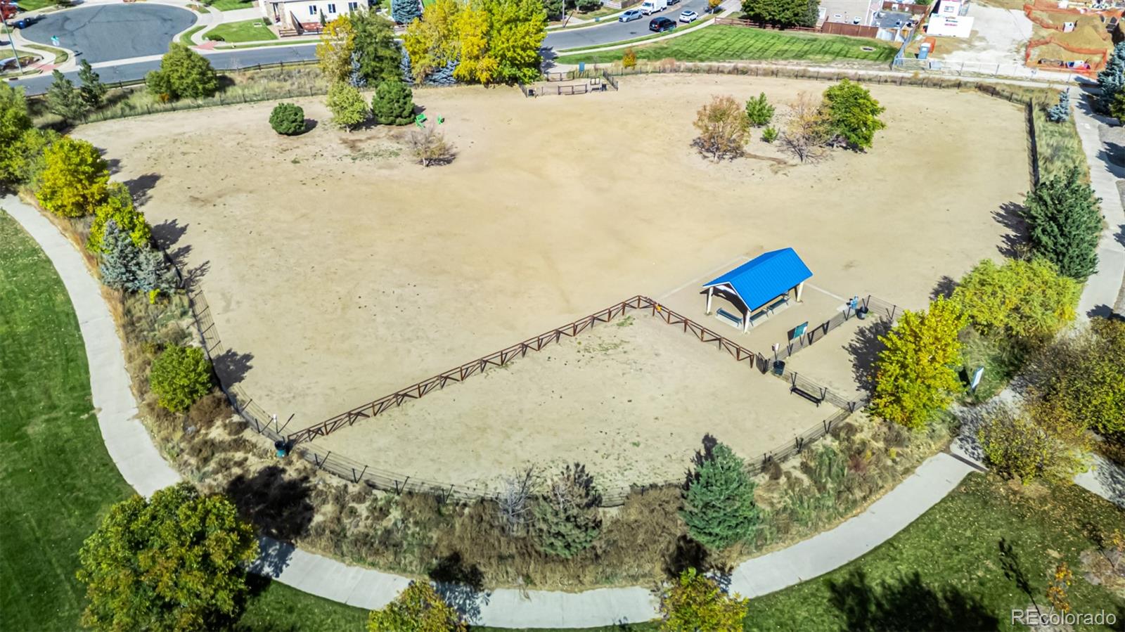 21300 East 42nd Avenue Denver, CO 80249 - Photo 9 of 48 an aerial view of a house with a yard and lake view