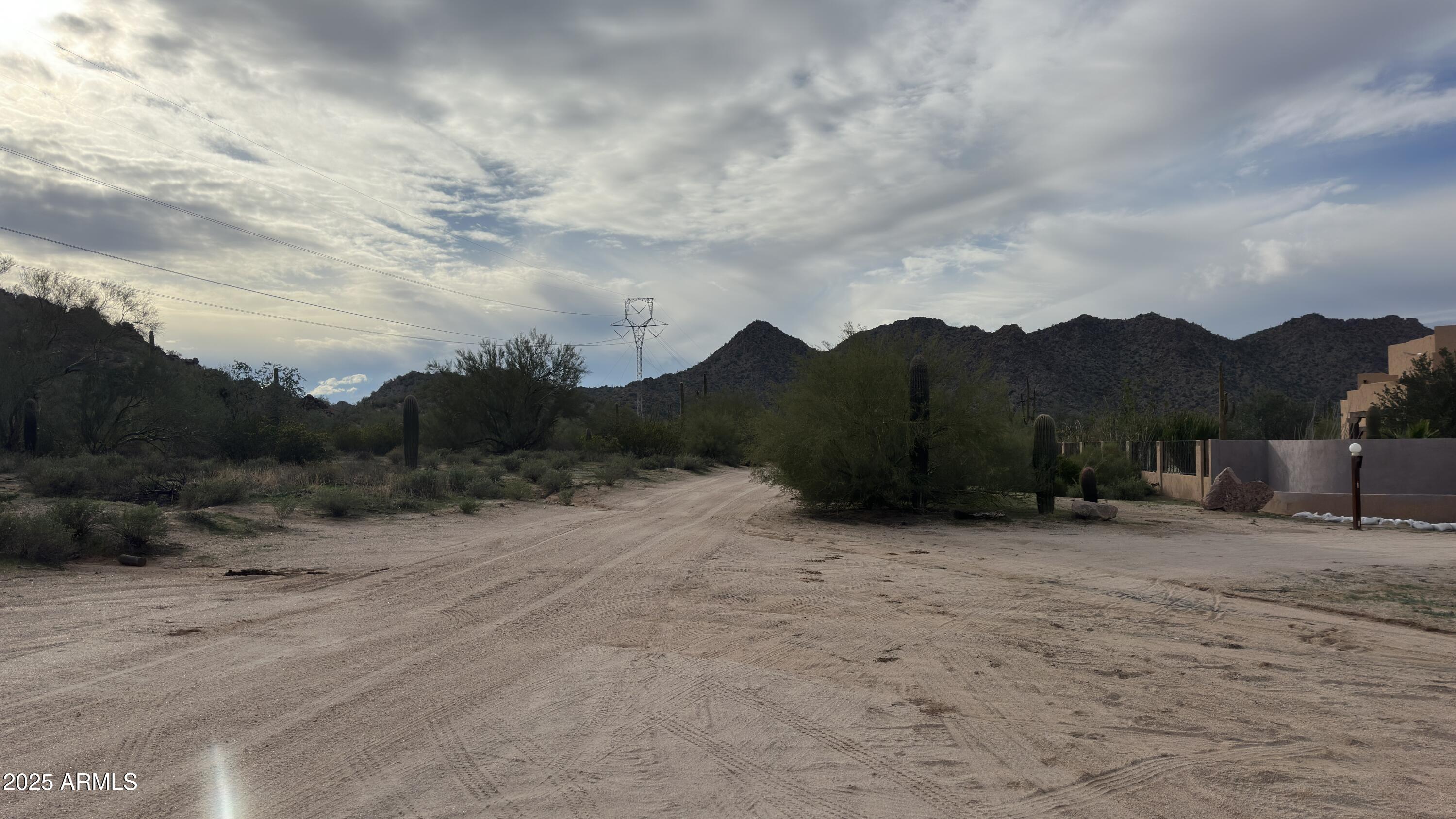 0 West Robin Road, Unit 31 Maricopa, AZ 85139 - Photo 7 of 8 a view of a dry yard with green space