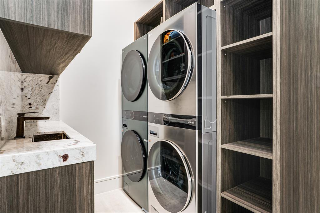 5510 Caladium Drive Dallas, TX 75230 - Photo 16 of 40 a utility room with dryer and washer