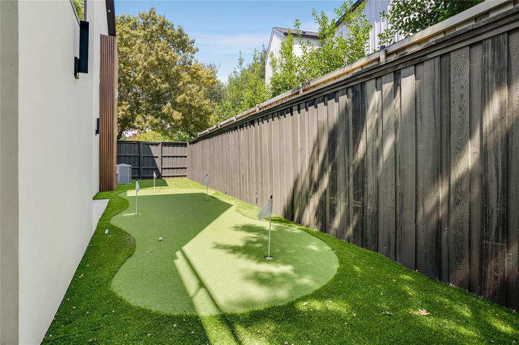 5510 Caladium Drive Dallas, TX 75230 - Photo 33 of 40 a view of swimming pool with a backyard and plants
