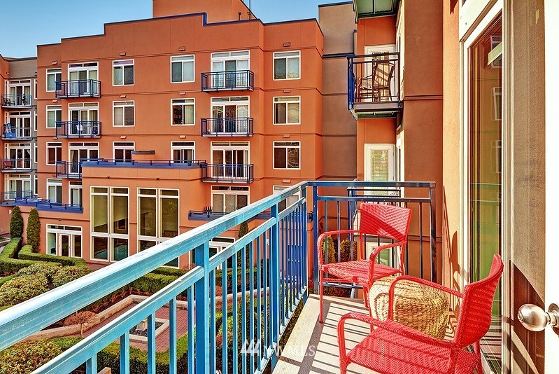 2415 2nd Avenue, Unit 547 Seattle, WA 98121 - Photo 2 of 20 a balcony view with an outdoor seating space