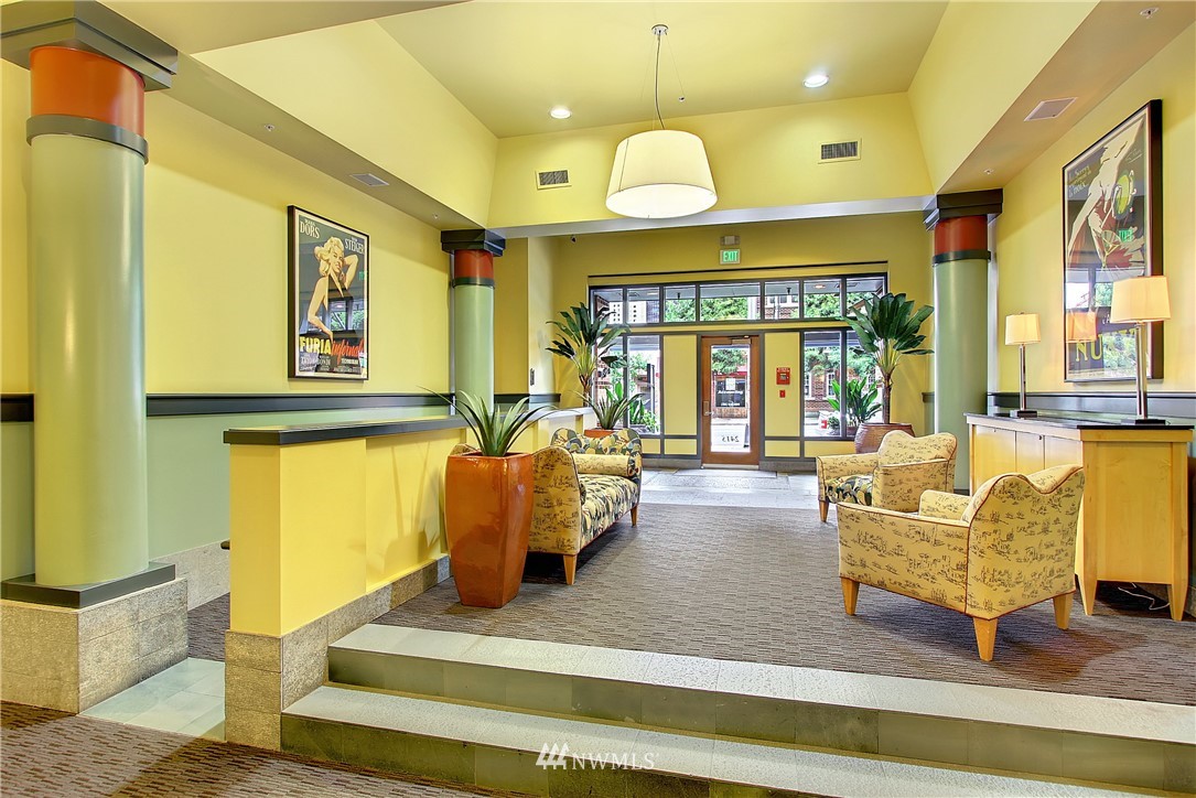 2415 2nd Avenue, Unit 547 Seattle, WA 98121 - Photo 15 of 20 a living room with furniture and a large window