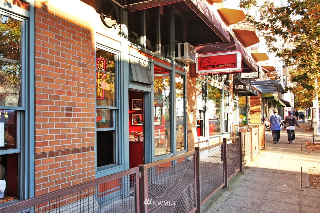 2415 2nd Avenue, Unit 547 Seattle, WA 98121 - Photo 19 of 20 a view of shops on a street