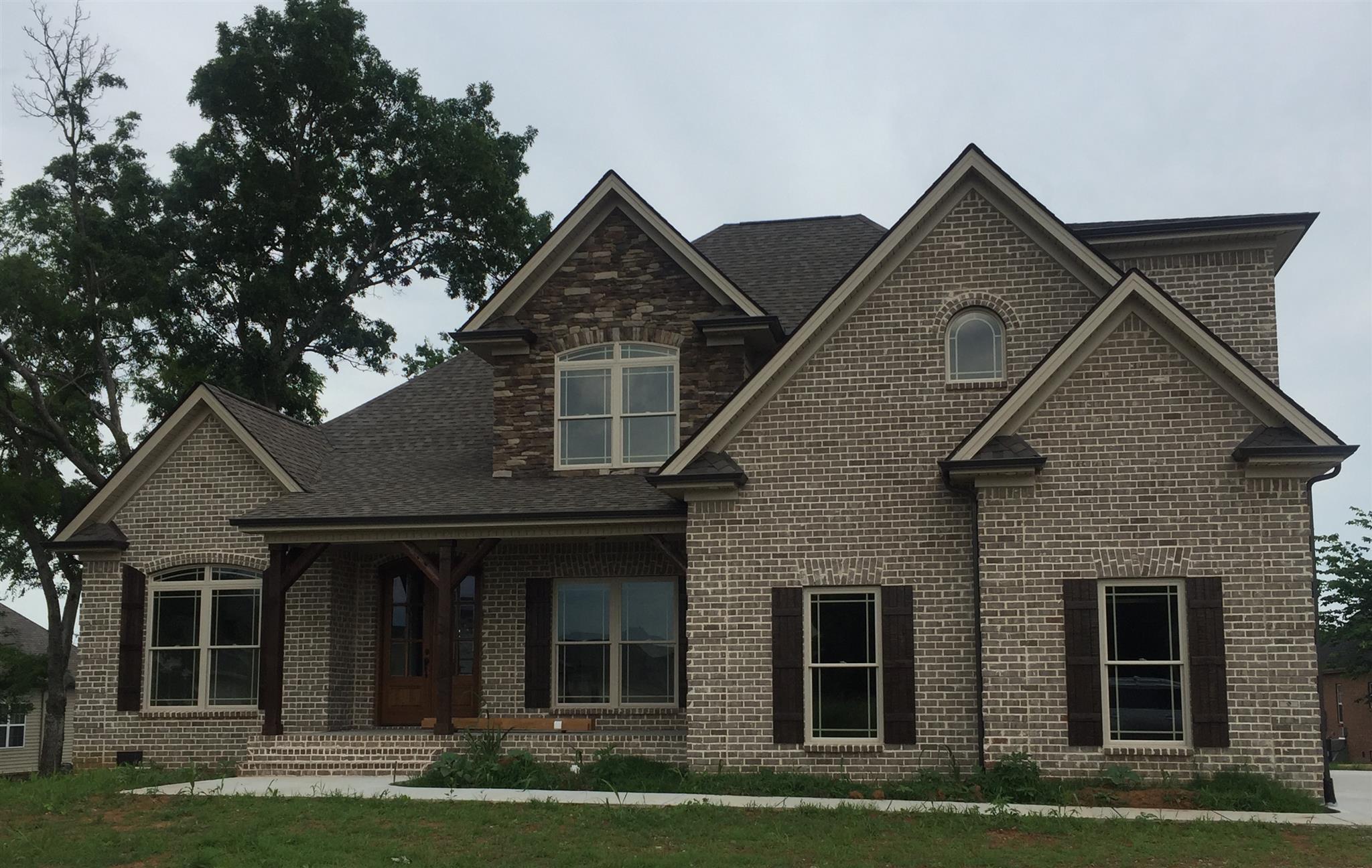 2618 Ritz Lane Murfreesboro, TN 37130 - Photo 2 of 10 a front view of a house with garden