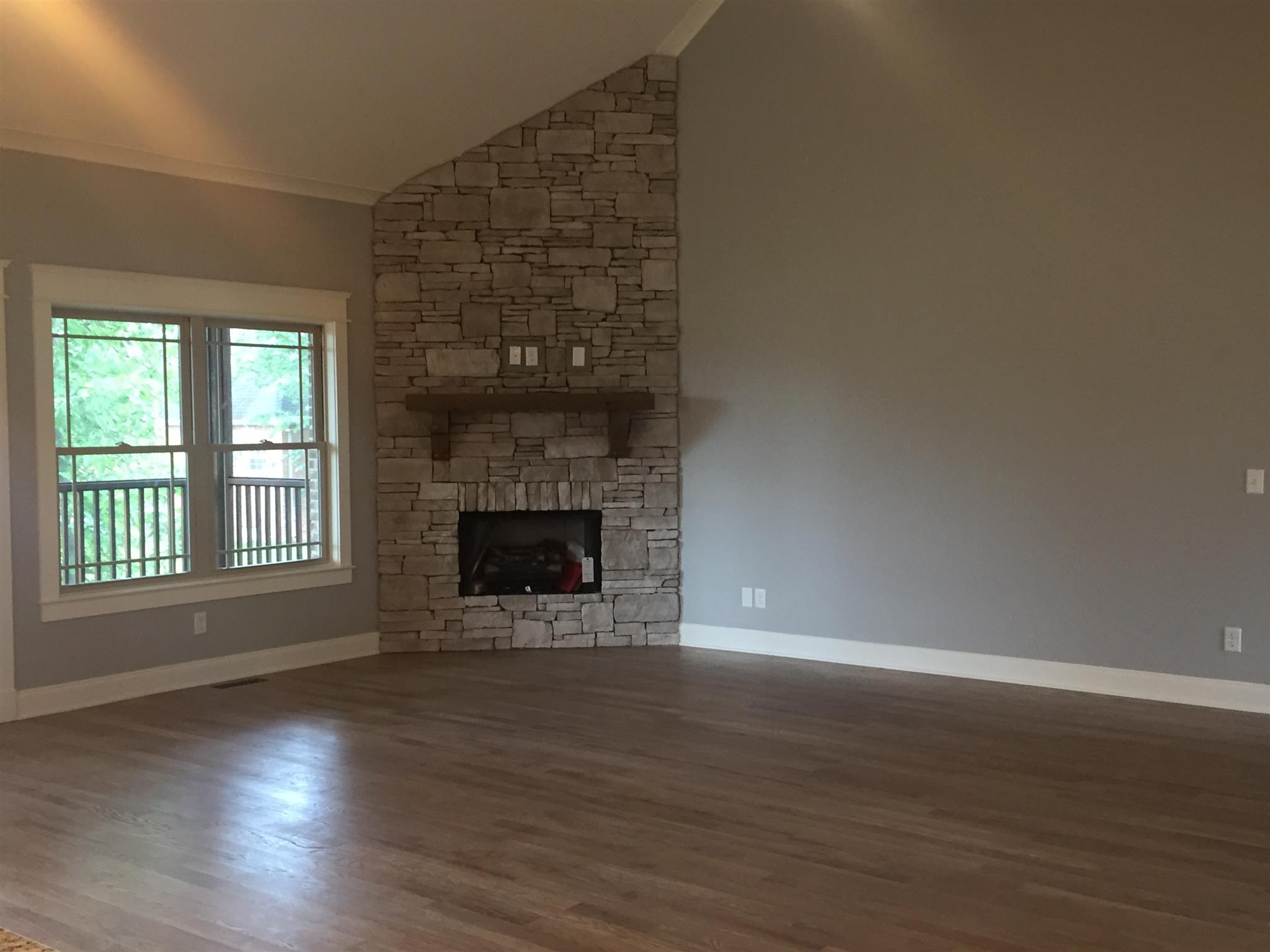 2618 Ritz Lane Murfreesboro, TN 37130 - Photo 4 of 10 a view of empty room with wooden floor and fireplace