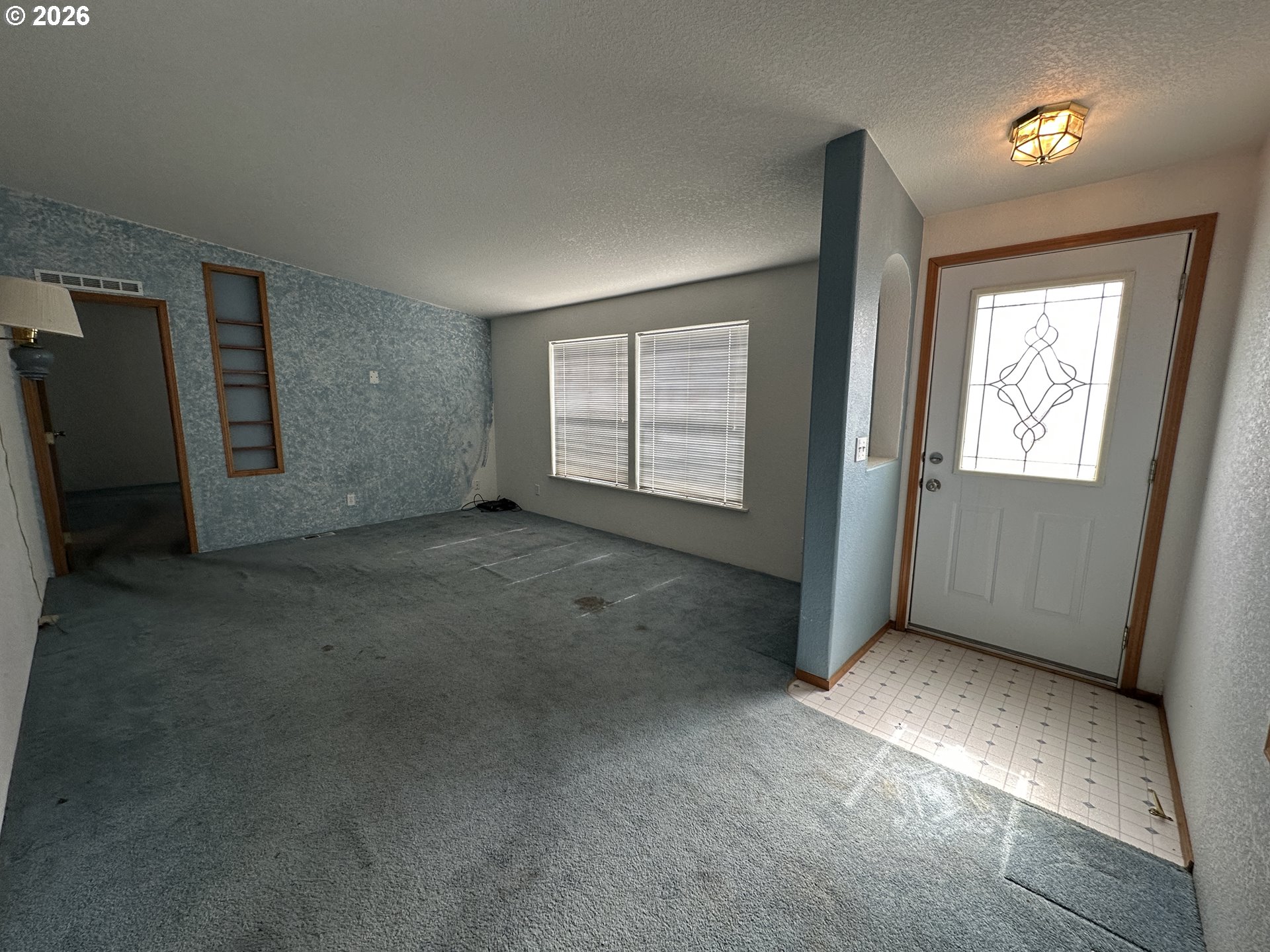 404 West 2nd Street Fossil, OR 97830 - Photo 9 of 19 an empty room with windows