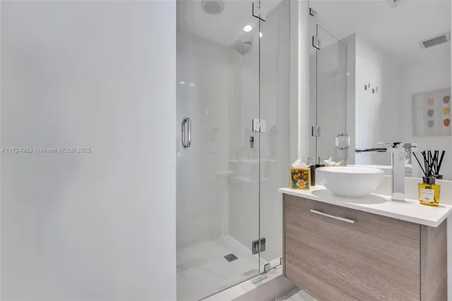 a view of a water with tall building