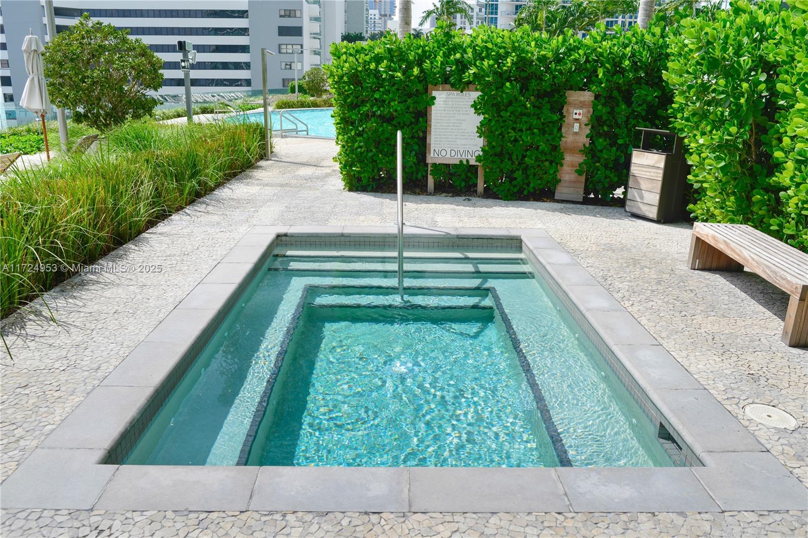 650 Northeast 32nd Street, Unit 2703 Miami, FL 33137 - Photo 28 of 48 a backyard with garden