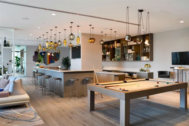 front view of a building with a garden