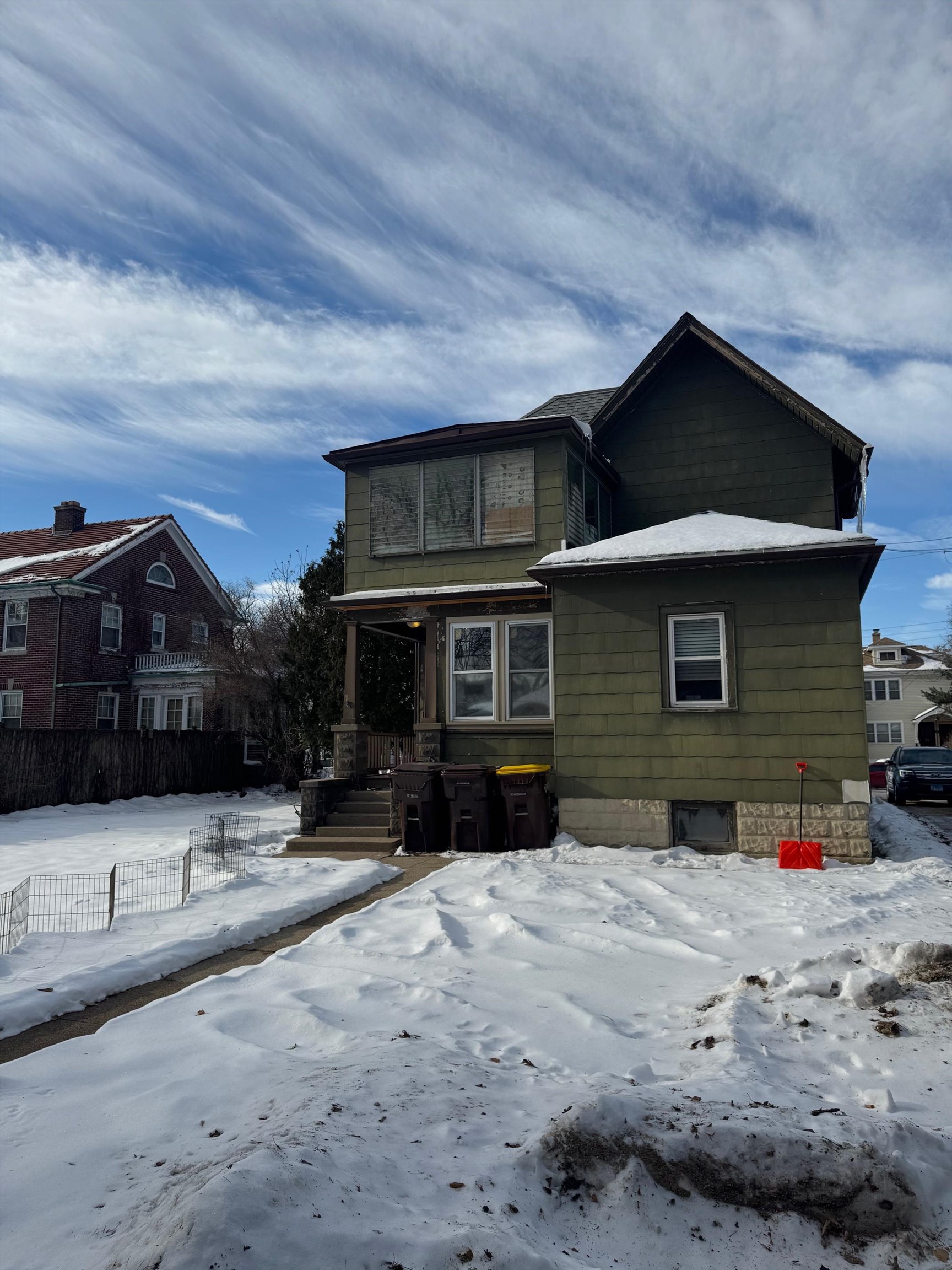 124 South Prospect Street Rockford, IL 61104 - Photo 12 of 13 a front view of a house with a yard