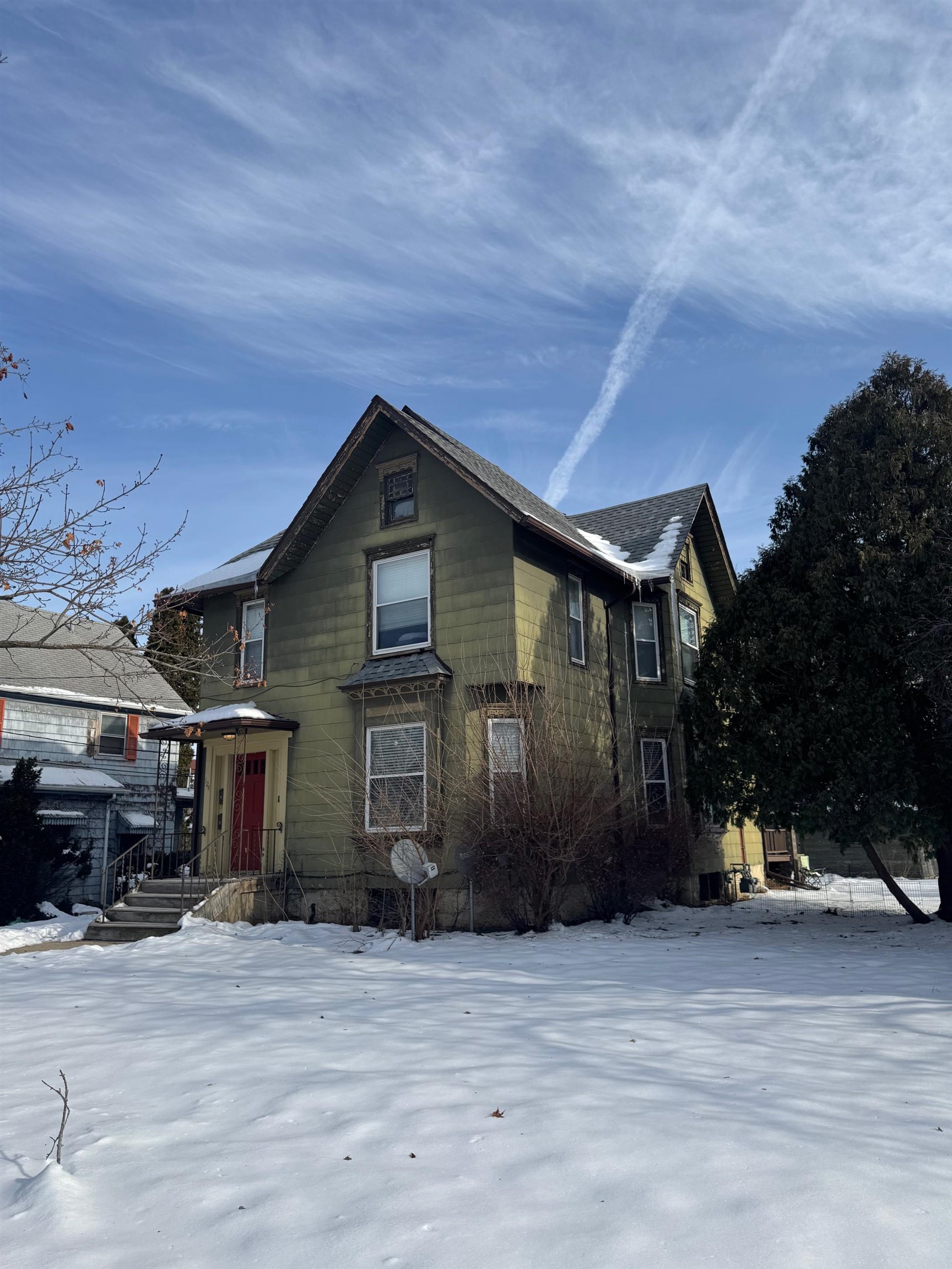 124 South Prospect Street Rockford, IL 61104 - Photo 2 of 13 a front view of a house with a yard