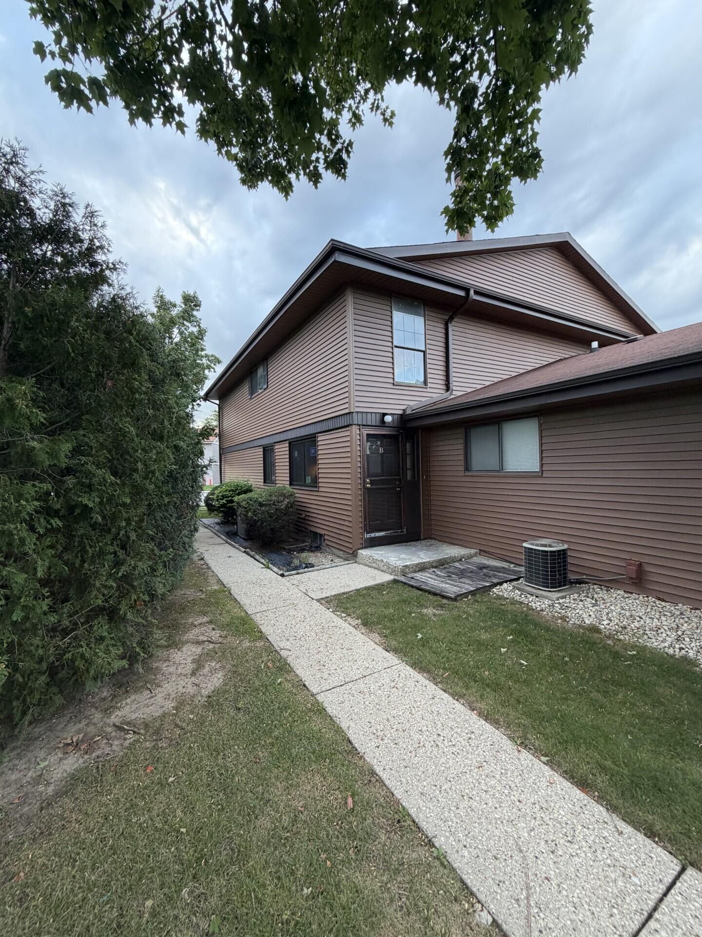 6972 North Raintree Court, Unit B Milwaukee, WI 53223 - Photo 1 of 7 Front