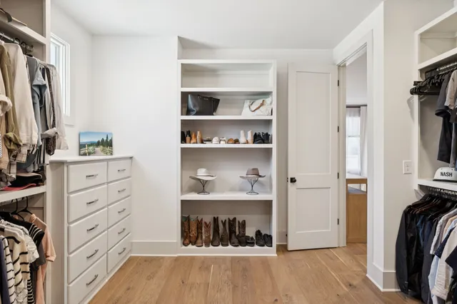 a kitchen with a sink and a washer dryer